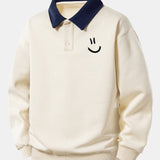 Velira Sweatshirts Bežinė / XS Atsipalaidavusio kirpimo šypsenėlės printo kontrastingas polo džemperis