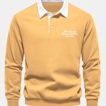 Velira Sweatshirts geltona / S Sloganas Spausdintas Kontrasto Polo Apykaklės Megztinis