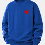 Velira Sweatshirts Mėlyna / XS Širdies dėlionės spaudinys laisvo kirpimo džemperis