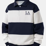 Velira Sweatshirts tamsiai mėlyna / S Relaksuotas Los Andželo spaudos spalvų blokas polo džemperis