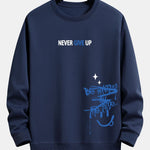 Velira Sweatshirts tamsiai mėlyna / XS Niekuomet nepasiduok Šypsenėlės Spauda Laisvo Kirpimo Megztinis