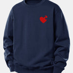 Velira Sweatshirts Tamsiai mėlyna / XS Širdies dėlionės spaudinys laisvo kirpimo džemperis